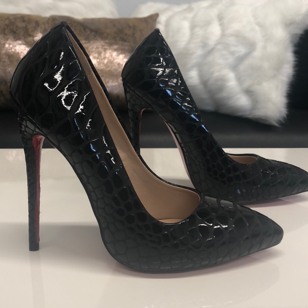 Black pat stilettos w/red sole bottoms